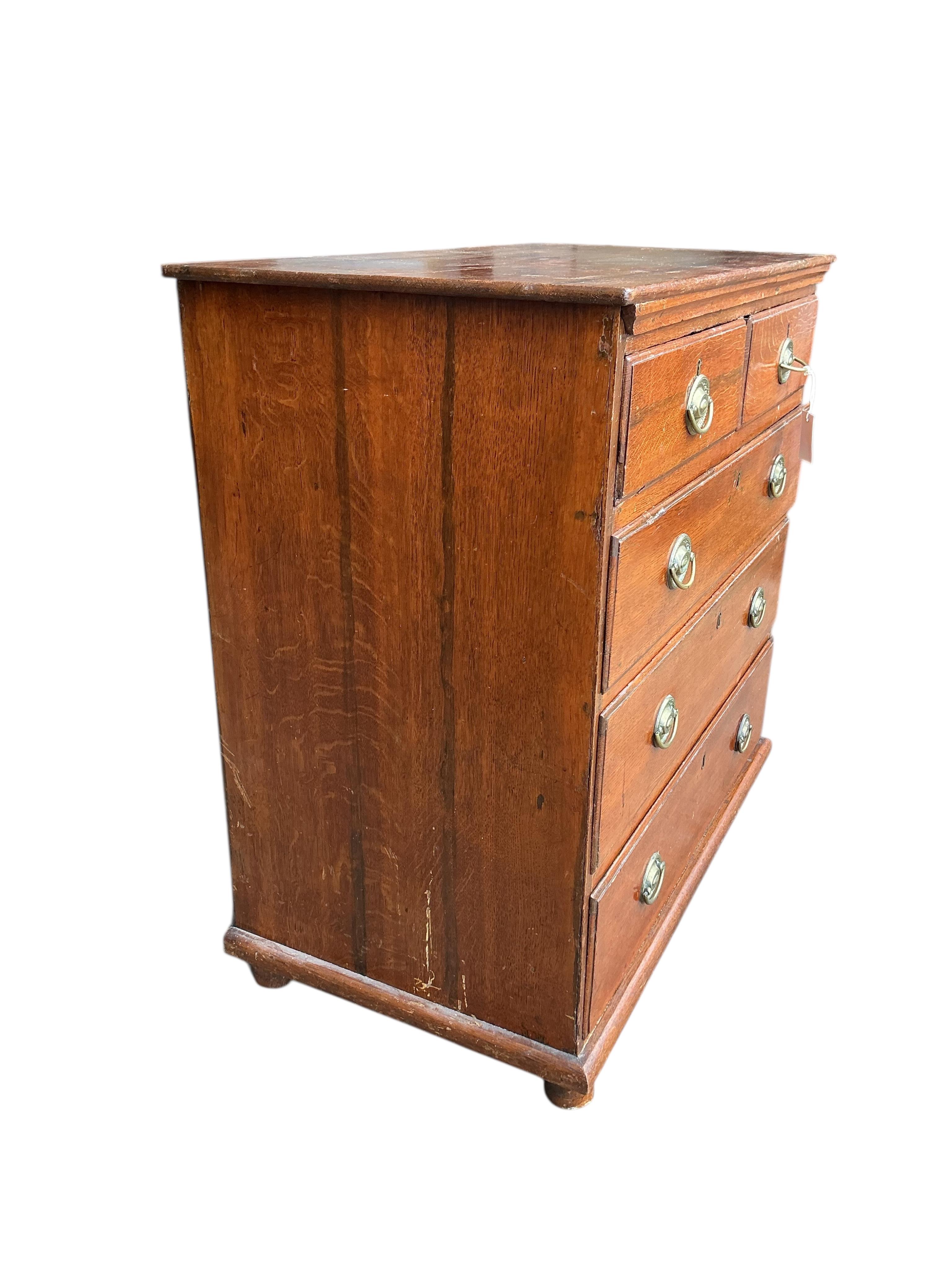 A George III oak chest of five drawers, width 93cm, depth 51cm, height 91cm